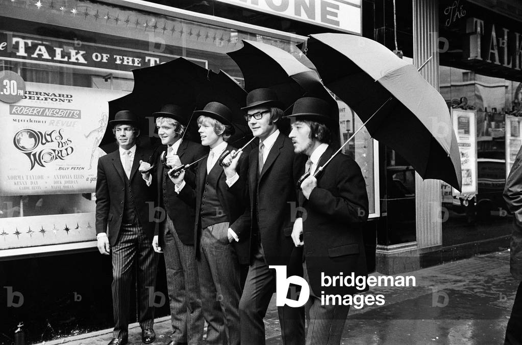 British pop group Hermans Hermits led by singer Peter Noone are to be the first ever all pop group to apper at London's Talk Of The Town. Here the group are pictured outside dressed up for rehearsals. 18th September 1969 (b/w photo)