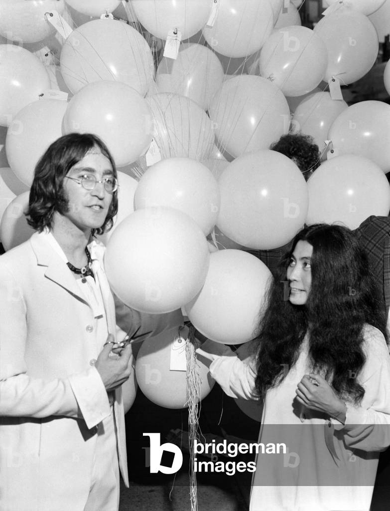 John Lennon with Yoko Ono at the unveiling of his painting at the Robert Fraser Gallery, Duke-Street, London, July 1968 (b/w photo)