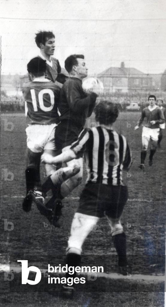 Player manager Jock Wallace clears from mclean and forrest at Berwick c. 1965 (photo)