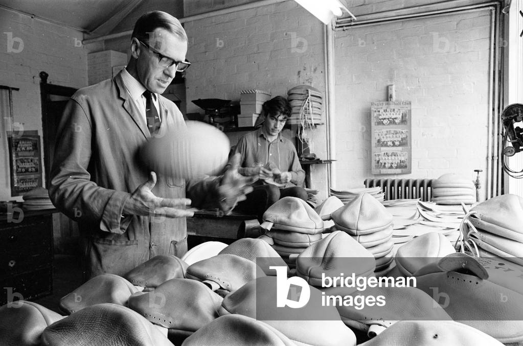 Quality Control inspection at the Gilbert Rugby Ball factory 1st September 1966 (b/w photo)