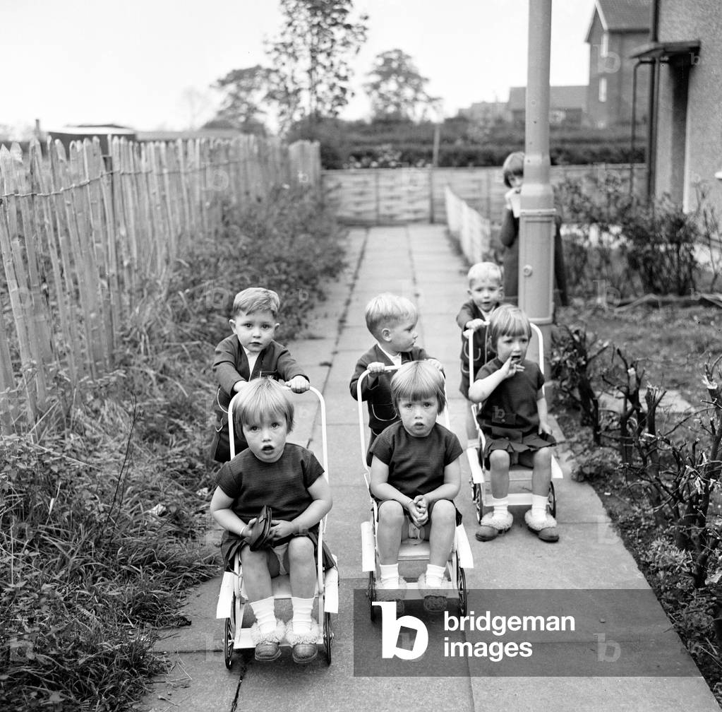 The Hatton triplets from Manchester, Deborah, Sharon and Allison with the Quilty triplets, Anthony, Bernard and Frank, 29th October 1964 (b/w photo)