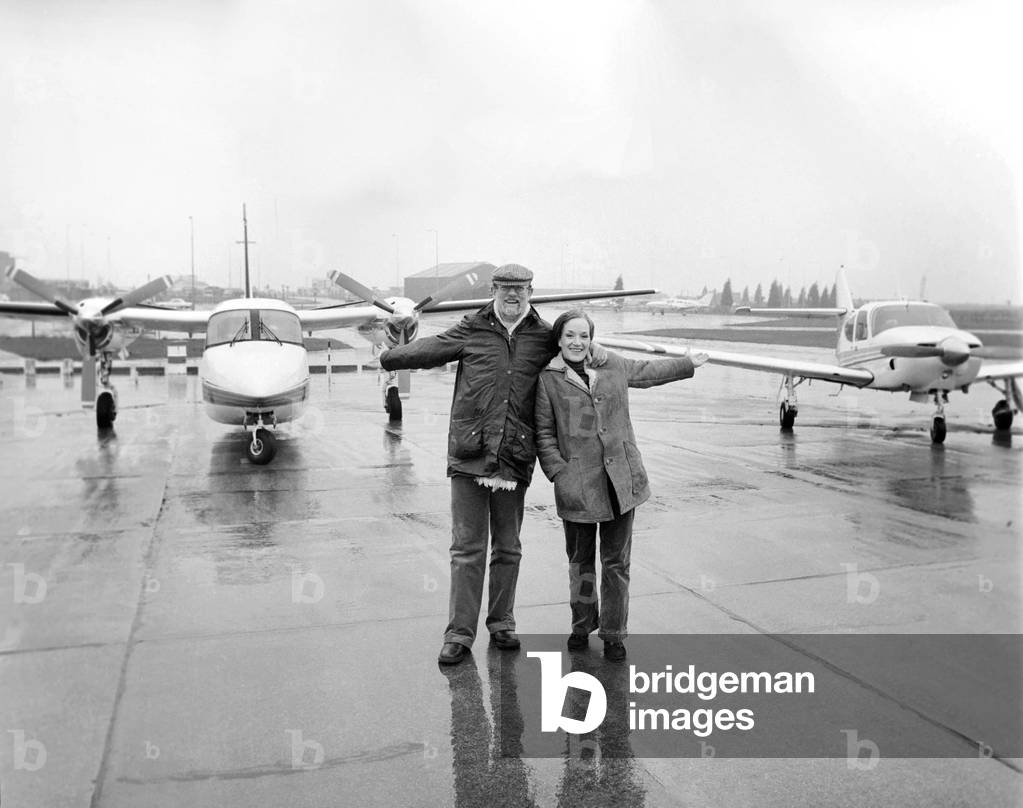 Singer Roger Whittaker and his wife Natalie, photographed at Stanstead Airport with their 