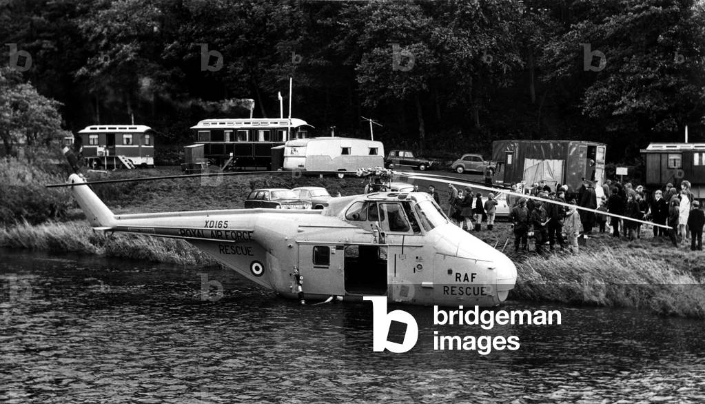 The scene at Rothbury after a RAF search and rescue Westland Whirlwind helicopter made a forced landing in the River Coquet. 16/10/1968