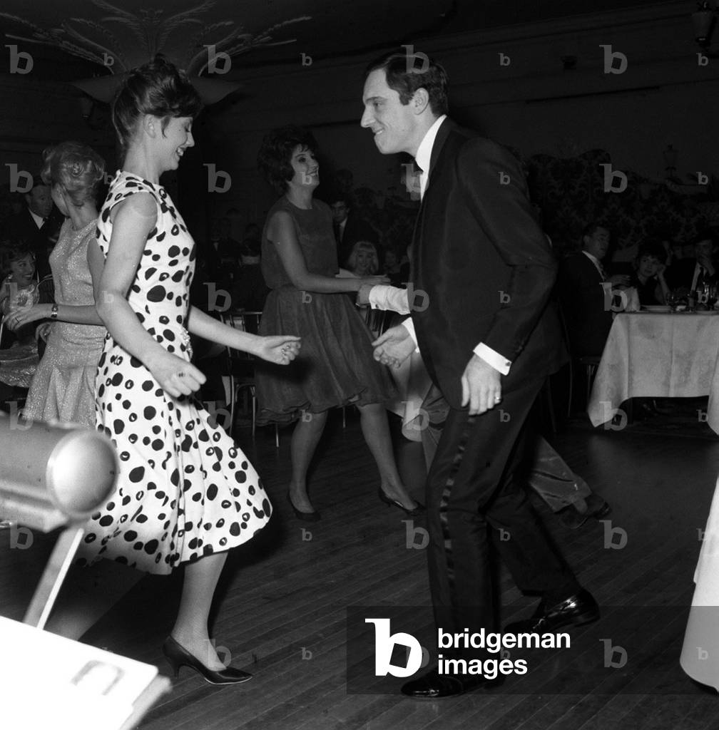 Anthony Newley and Alma Cogan in the background dancing at The Hungaria Restaurant in Lower Regent Street London, 6th February 1962 (b/w photo)