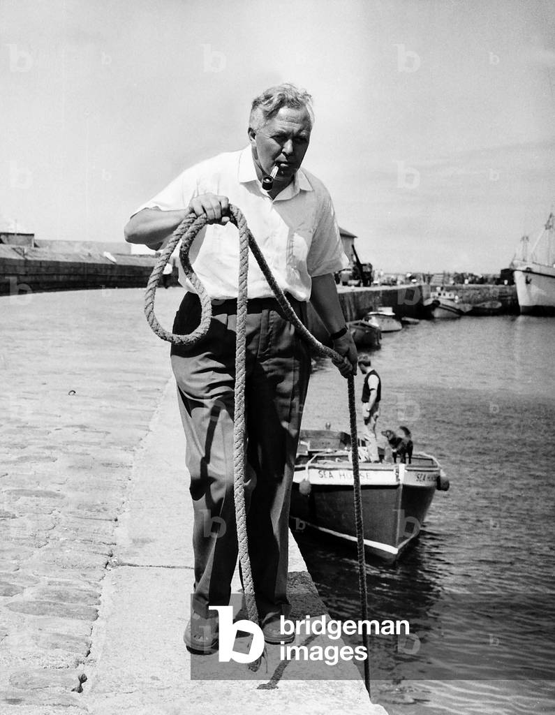 Harold Wilson MP on holiday in the Scilly Islands 1963 ties up his boat