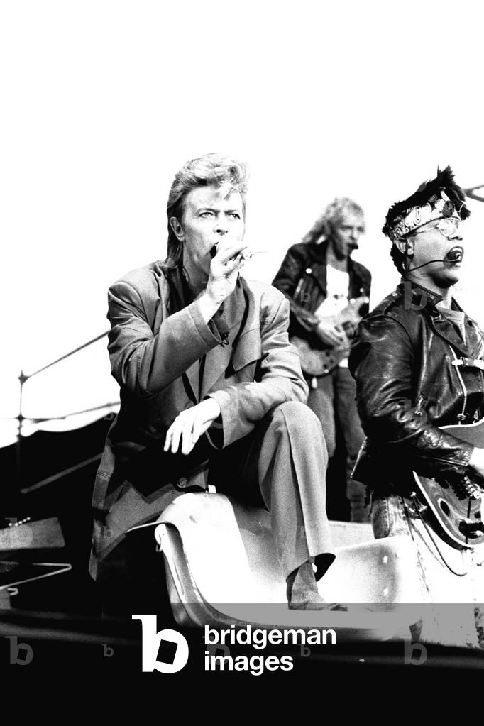 David Bowie performing at Roker Park, Sunderland on 23rd June 1987 in his Glass Spider Tour, 1987 (b/w photo)