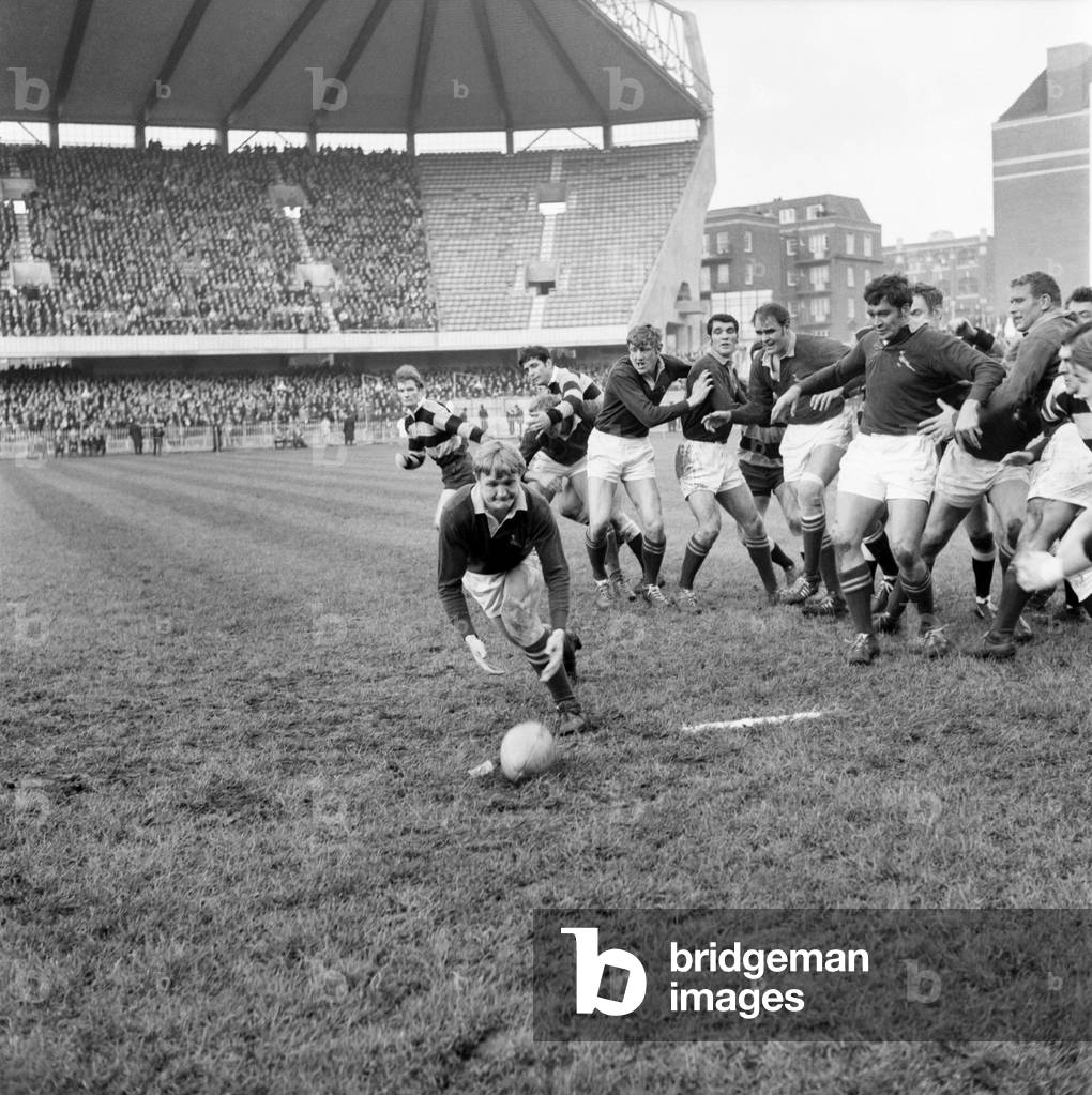 South Africa Rugby Union tour 
Cardiff v Springboks
Van der Merwe, the Springbok's winger, wearing dark shirt and nearer camera, is sent the wrong way by a pass 
December 1969