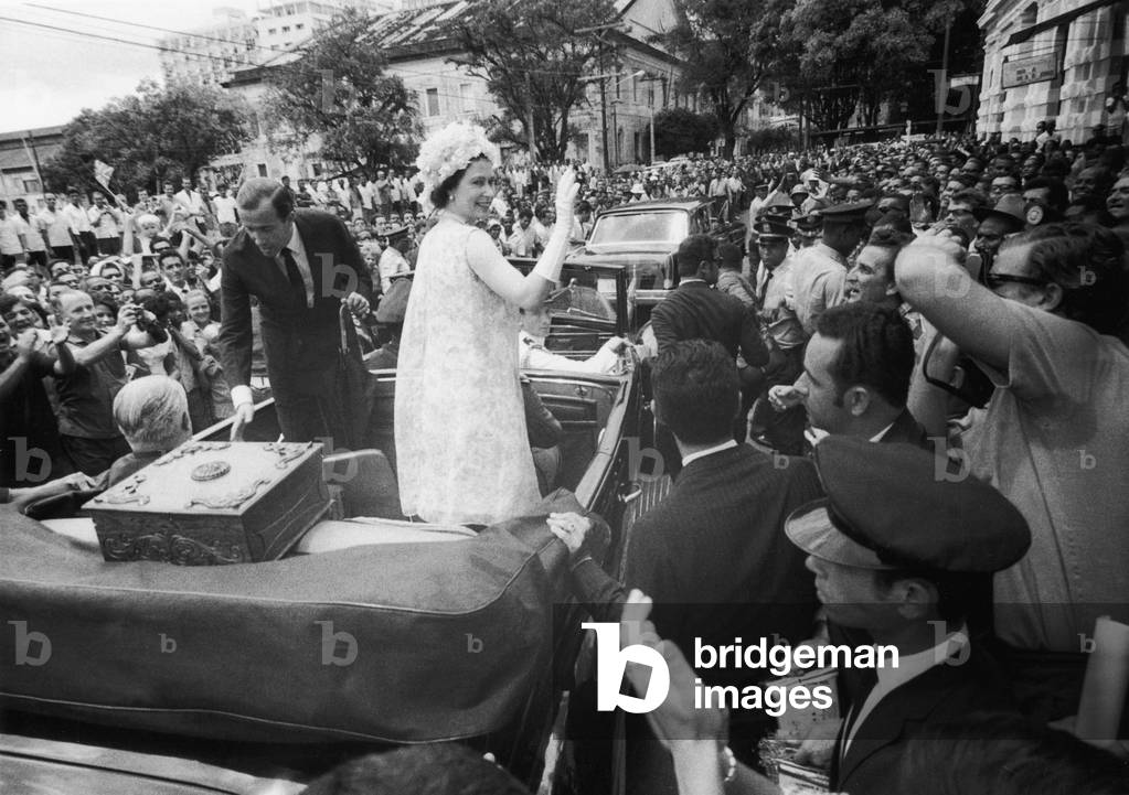 Royal Tours, Salvador, Brazil. Queen Elizabeth II waves from ther motorcade.
6th November 1968.