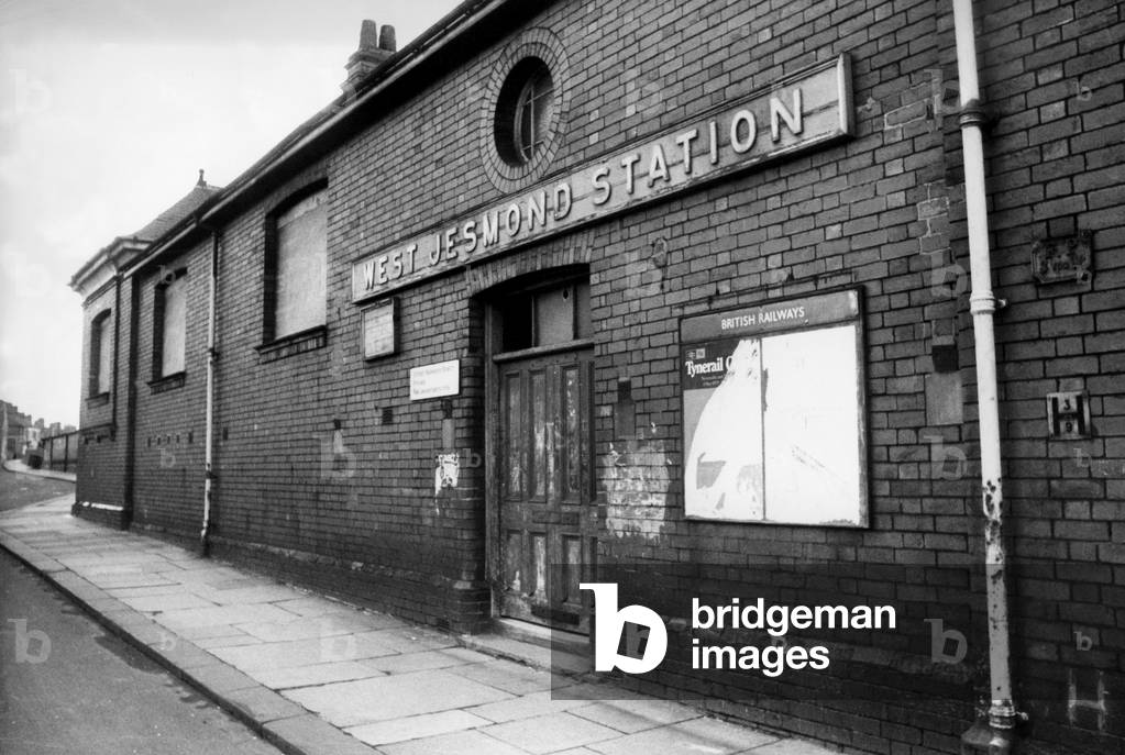 The dilapidated exterior of West Jesmond Railway Station showing the door of the underpass closed on 12th March 1978 (b/w photo)
