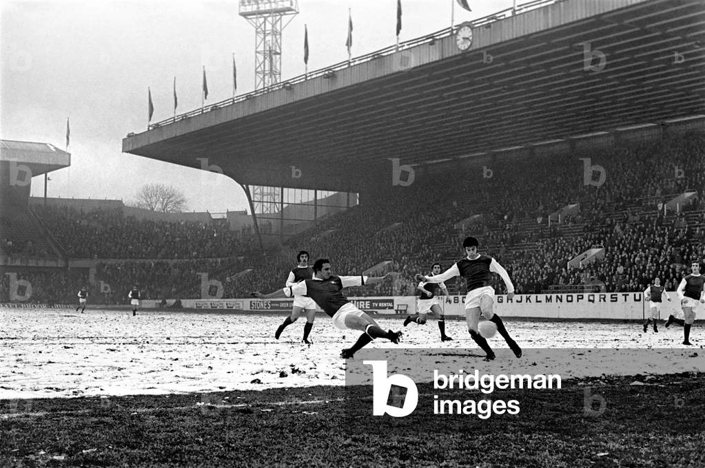Sport: Football: Sheffield Wednesday v. Arsenal. Neill clears for a corner as Whitham comes in. December 1969 (photo)