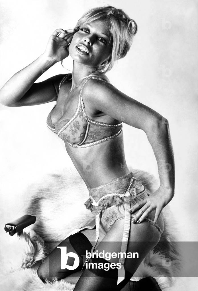Clothing Underwear: A take-a-deep breath sort of push-up bra in red lace over white silk, £4.10; matching. Suspender belt. £3.65; and red pure silk panties, £2.05. Not cheap, but you have to admit the effect is quite devastating. July 1973 P018279