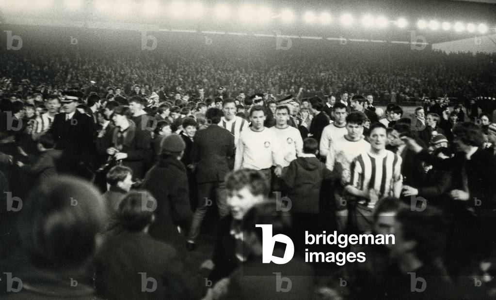 Kilmarnock 2-0 Loko Leipzig, The Inter Cities Fairs Cup match at Rugby Park, Kilmarnock, Scotland, 26th April 1967. Supporters fans invade the field to cheer off players (photo)