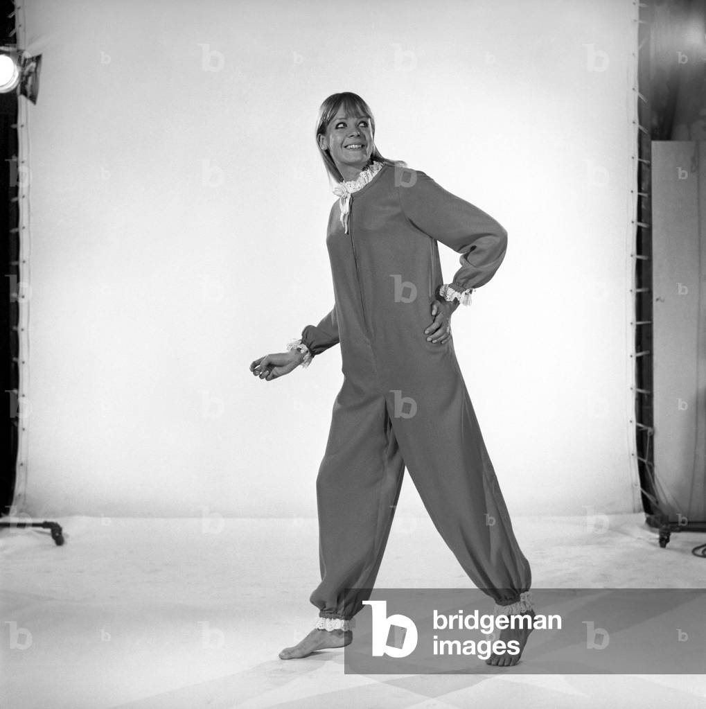 Model, Judy Weldon wearing clown pyjama suit, 1965 (b/w photo)