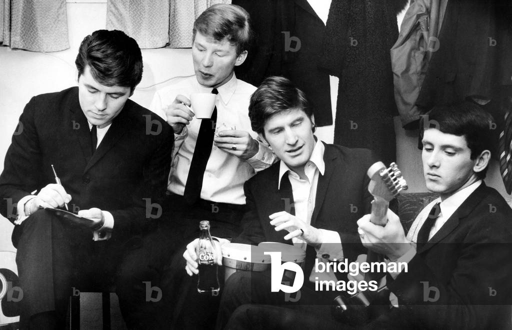 The Searchers (left to right: Mike, John, Chris and Frank) who were one of the main attractions at the Coventry Theatre show. 15th November 1964 (b/w photo)