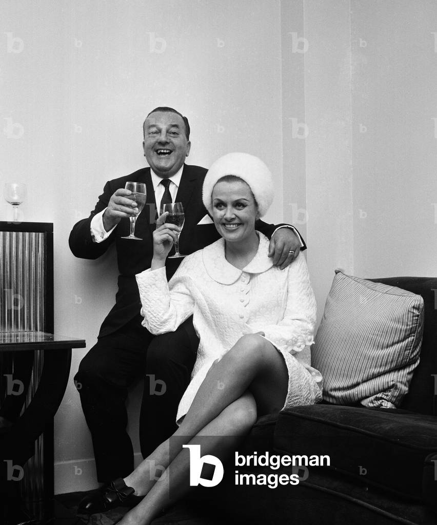 British musician Ronnie Ronalde toasts his new bride Yana after their wedding ceremony at leeds Registry office.
2nd February 1967.