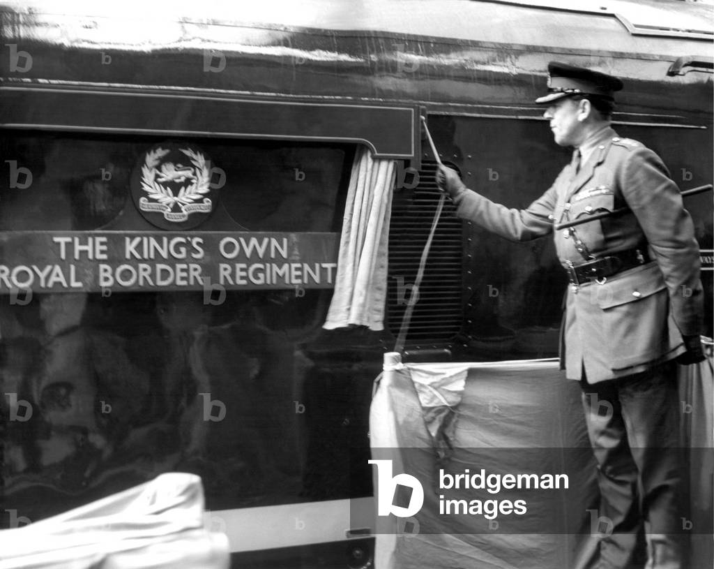 Colonel H. J. Darlington, colonel of the Lancastrian Brigade naming a 2,500 h.p. diesel locomotive The King's Own Royal border Regiment at a ceremony on Platform six at Carlisle Citadel Station on 1st may 1963