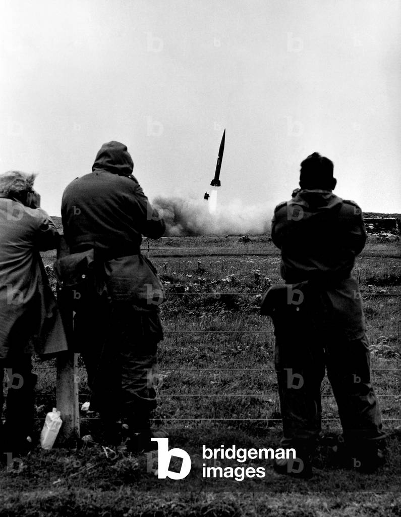 German gunners watch as a Pershing missile is launched from their South Uist base, September 1965 (b/w photo)