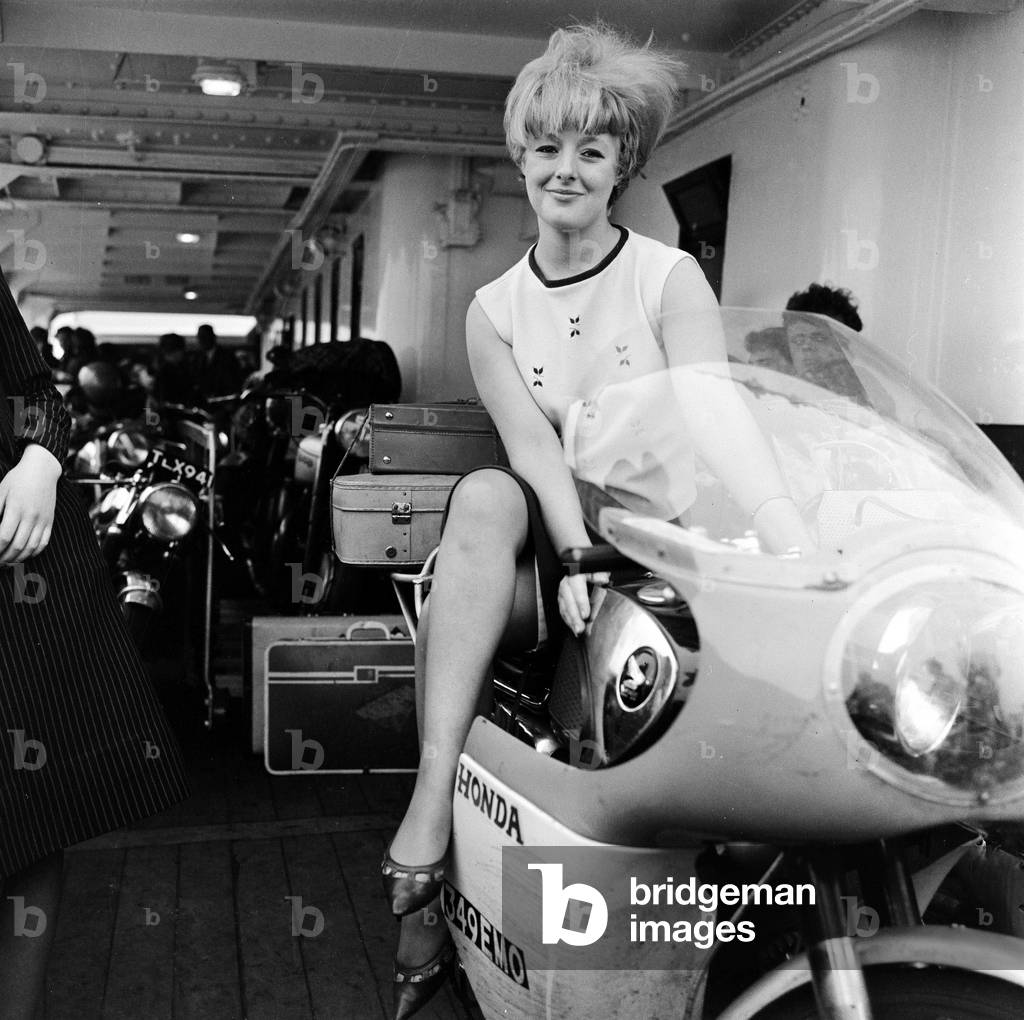 TT race fans on the ferry over to the Isle of Man. 29th June 1965 (b/w photo)