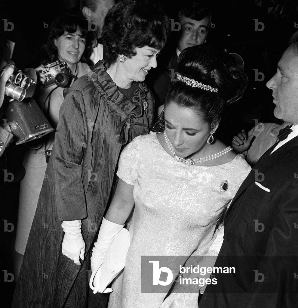 Elizabeth Taylor and husband Richard Burton at Hollywood Party, November 1965 (b/w photo)