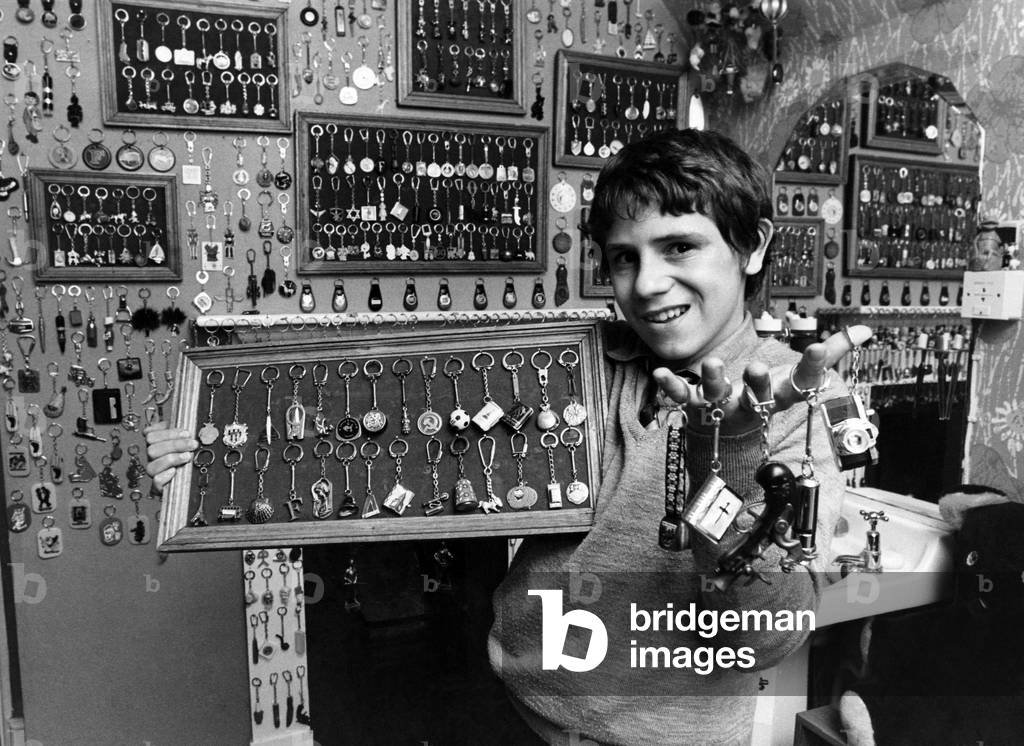 Paco is lord of the rings. Schoolboy Paco Irquierdo-Alvarez with his collection of key rings. March 1979 P017697