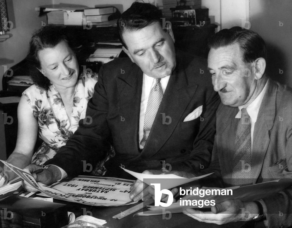 Three people who are responsible for guiding the fortunes of the Infantile Paralysis Fellowship (IPF) in Birmingham are (left to right) founder of the Birmingham branch Mrs Edna Collins, Mr Walter Treadwell (secretary) and Mr Harold Burke (chairman). 5th April 1960 (b/w photo)