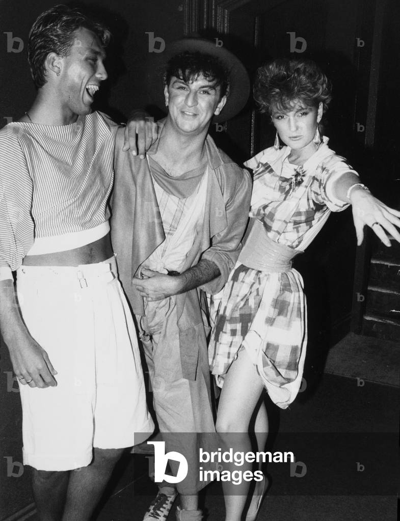 German society girl Francesca Thyssen with singer boyfriend Steve Strange of the band Visage (centre) and Martin Kemp from Spandau Ballet January 1984 (b/w photo)