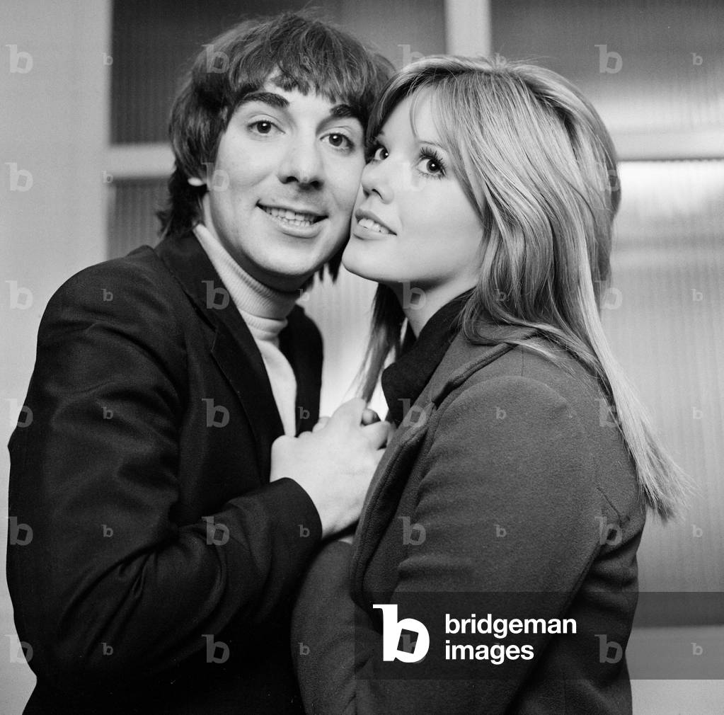 Keith Moon, drummer of British rock group The Who, pictured with his wife Kim. 24th March 1969 (b/w photo)