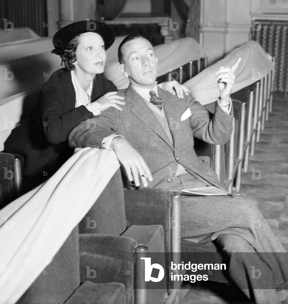 Actor and playwrite Noel Coward and Actress Gertude Lawrence send here during the rehearsals of Private Lives