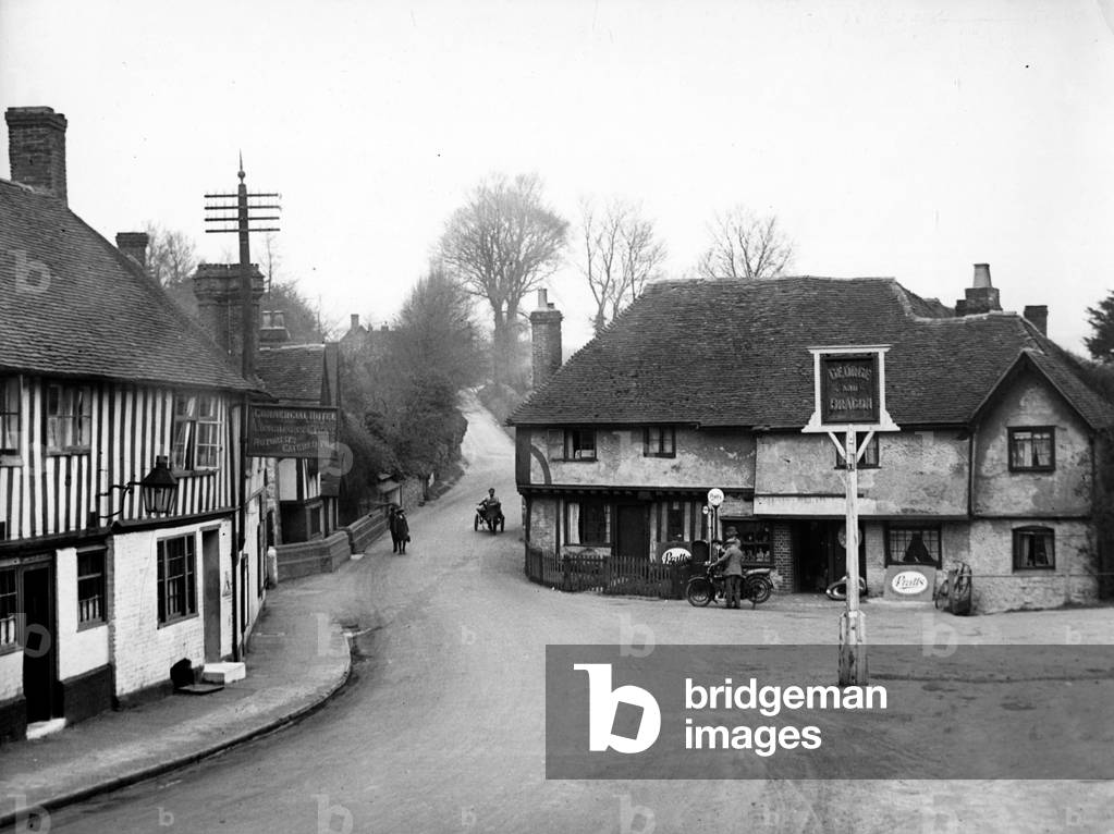 General view showing the main street passing through the village of Ightham in Kent. 
 Circa 1935