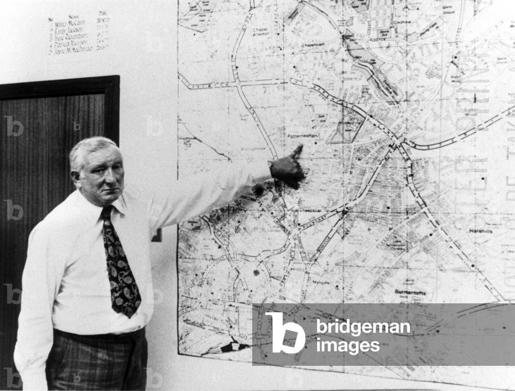 Assistant Chief Constable George Oldfield who led the investigation in the Yorkshire Ripper murders seen here leading a briefing, c.1979 (b/w photo)