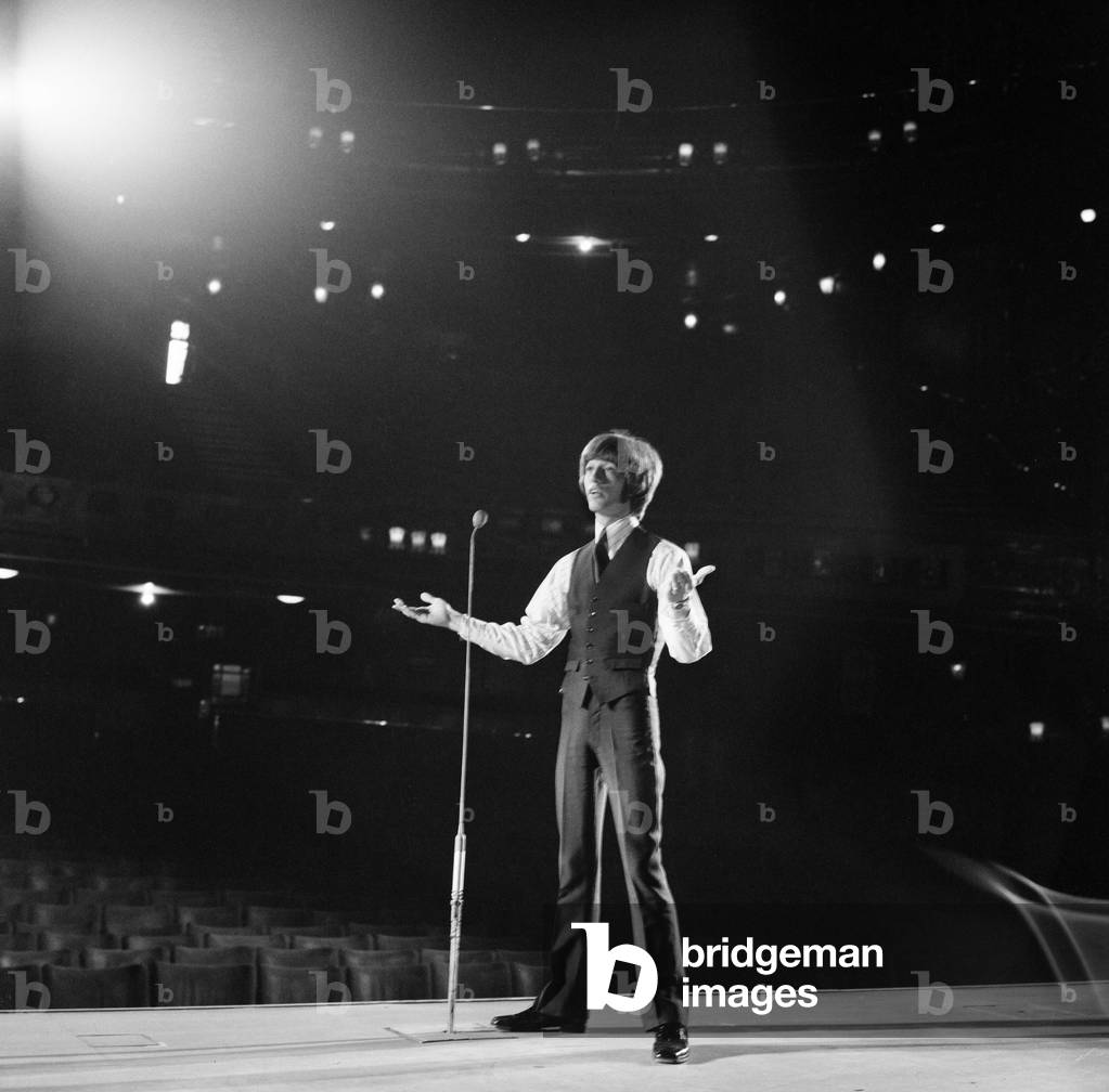 Robin Gibb, Singer, rehearsing on stage at the London Palladium ahead of his first solo performance, London, 25th June 1969 (b/w photo)