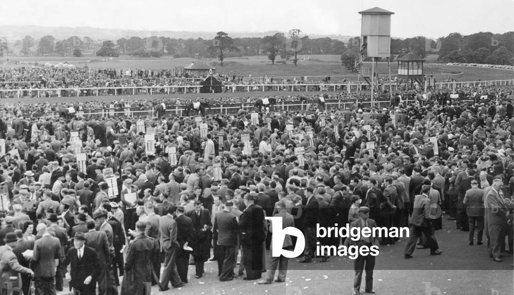 Bookies stands showing like little banners amongst the crowd at Newcastle's Gosforth Park race course on Northumberland Plate Day 27th June 1961 (b/w photo)