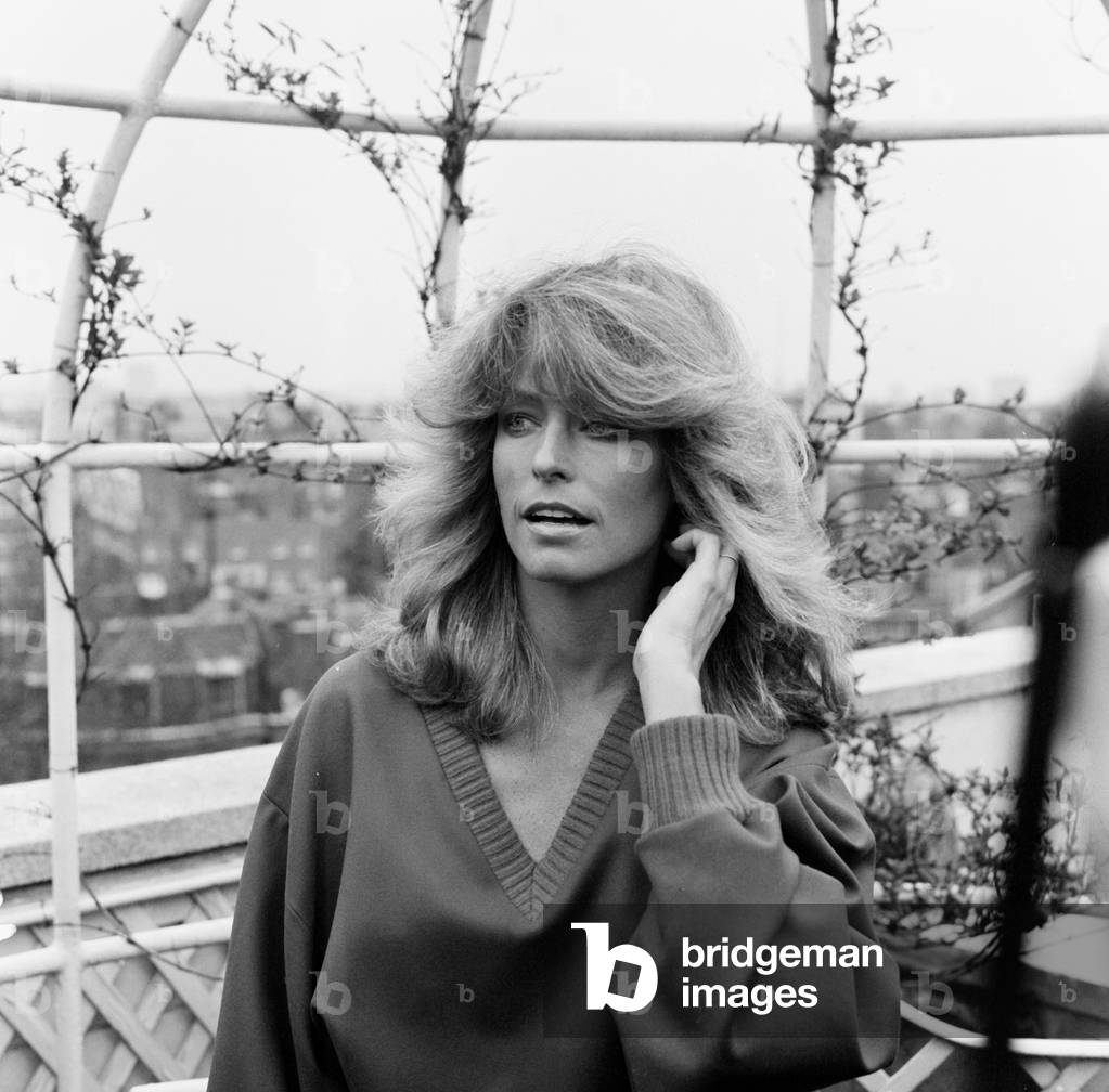 US actress Farrah Fawcett Majors pictured at a photo reception at the Dorchester Hotel in London April 1978 (b/w photo)