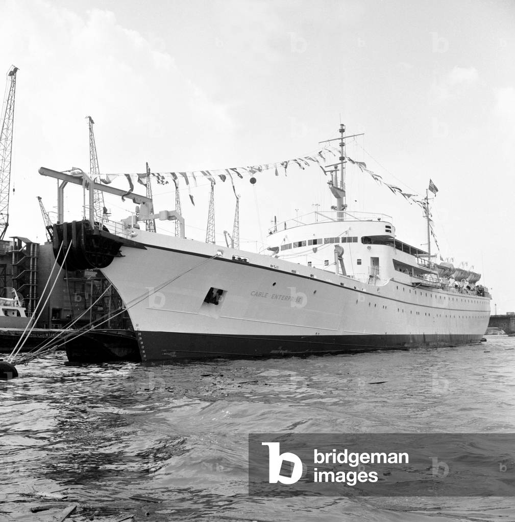 Cable and Wireless Ltd company repair ship CS 'Cable Enterprise' in the Thames at Tower Pier. 5th August 1964 (b/w photo)