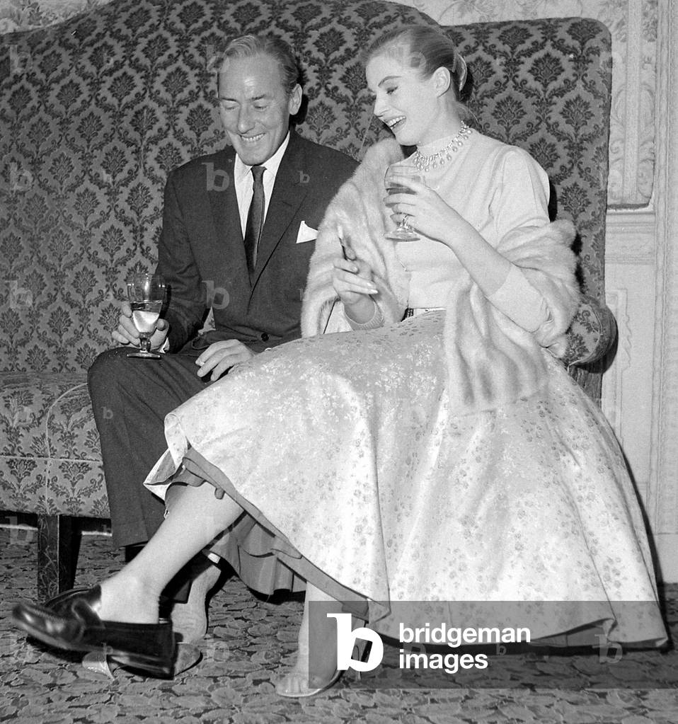 Anita Ekberg seen here attending a Press reception in London with actor Michael Wilding, 17/11/1955 (b/w photo)
