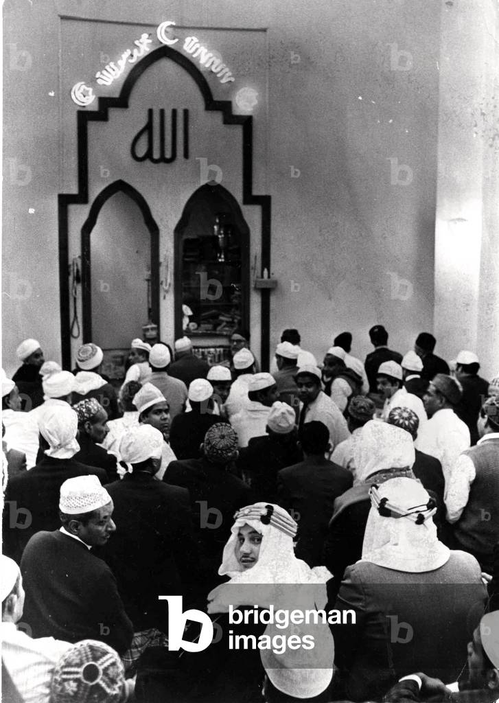 The Muslim community in Cardiff - The packed Mosque at the Islamic Centre, Butetown, Cardiff for the feast of Ramadhan, November 1971 (b/w photo)