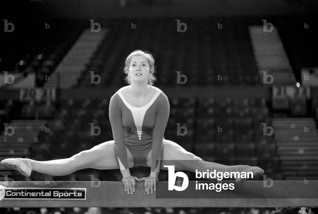 Women gymnasts from all over the world will be competing in the Champions All Tournament presented by the British Amateur Gymnastics Association and the Daily Mirror at the spectacular at the Empire Pool, Wembley on Saturday, 12th April 1975 (b/w photo)