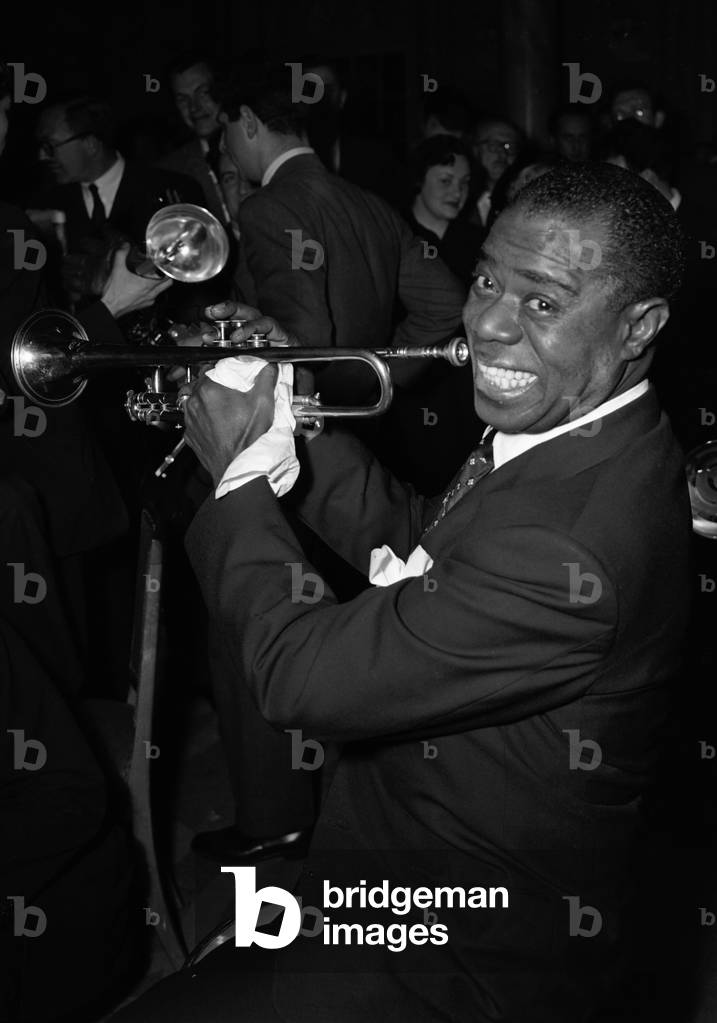 Louis Armstrong seen here performing in London in May 1956