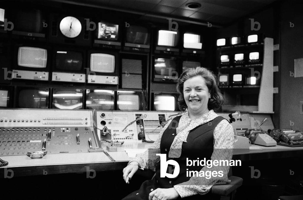 Diana Edwards-Jones makes her own piece of history during the coming general election by being the first woman in charge of a television election special. She will be in control of ITN's election night programmes right through to the early hours. Diana Edwards-Jones, pictured at the controls of ITN's election control room. 27th February 1974 (b/w photo)