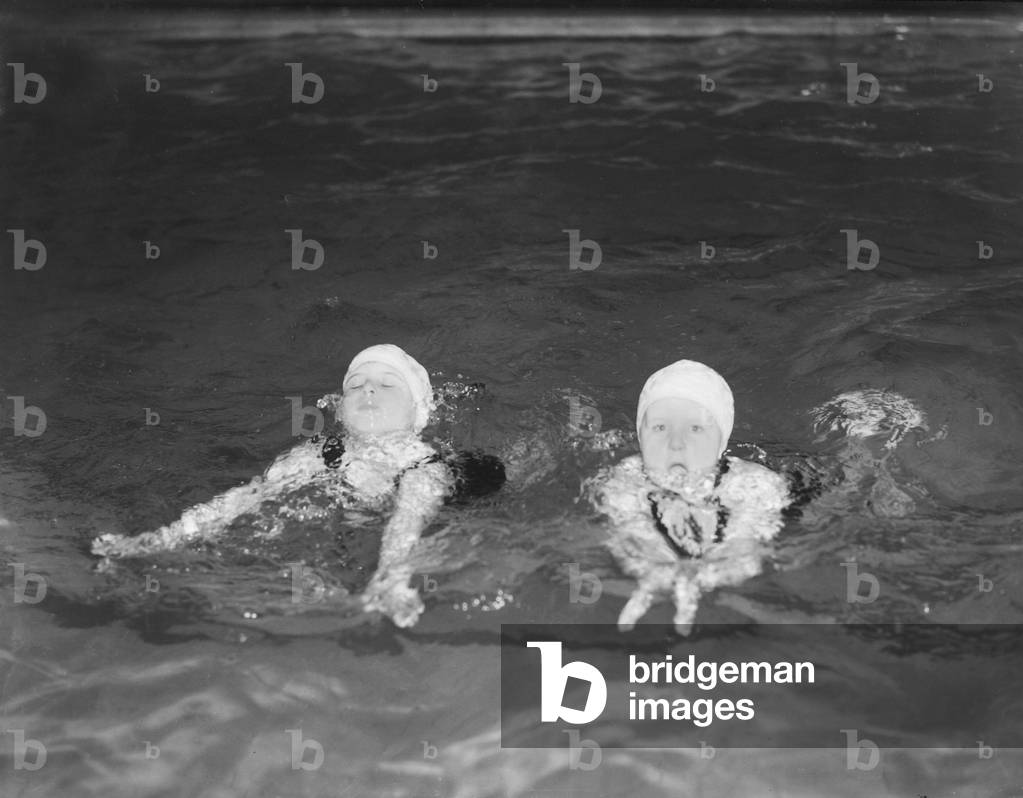 Baby Swimmers Tiny Tots in the deep end of Ilford Swimming Baths, 1952 (b/w photo)