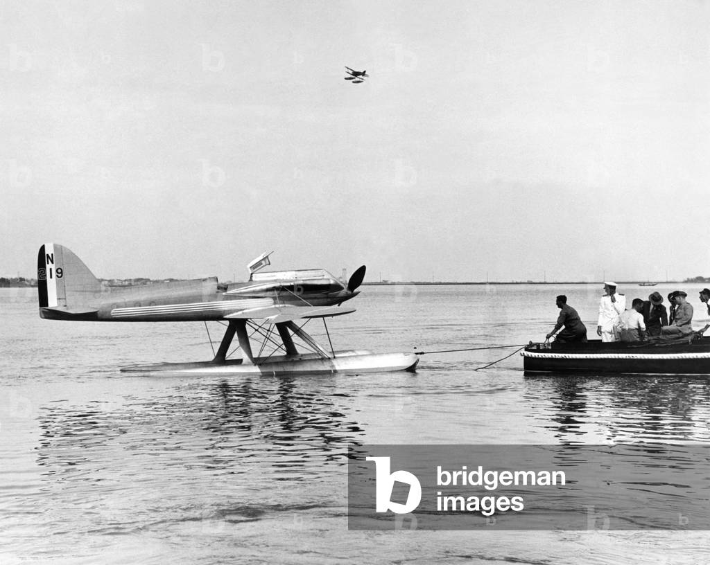 Special pictures taken at Venice during flights in which Squadron leader L. H. Slatter, piloting a Supermarine Napier machine, attained the amazing speed of over 300 miles an hour. The machine is one of the three British entrants for the Schneider Cup race. 
September 1927
