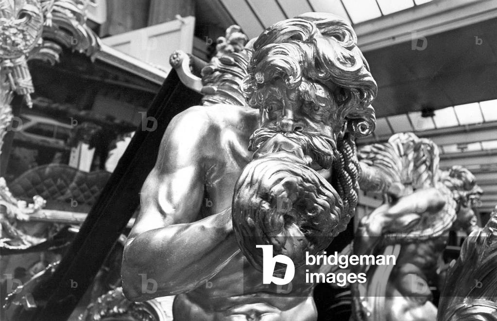 A close-up of one of the two figures at the front of The State Coach which was finished in the year 1761and built under the supervision of Sir William Chambers, 1970