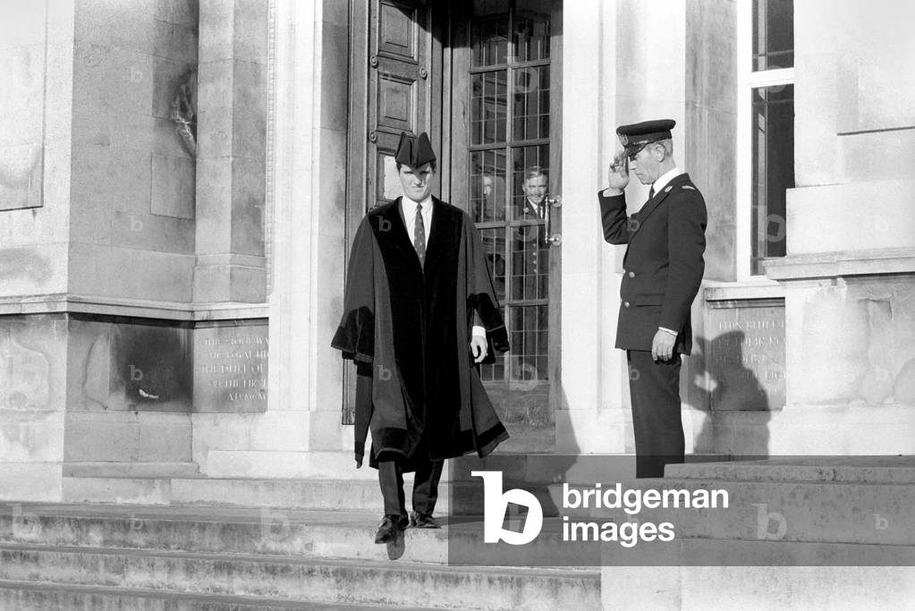 Southampton skipper Terry Paine apart from various business interests is now a councilor with Southampton Borough Council. Terry has recently opened yet another business venture, a Greengrocers. Terry leaves Southampton Town Hall passing a saluting sergeant at arms Mr. Charles Watson. November 1969 (photo)