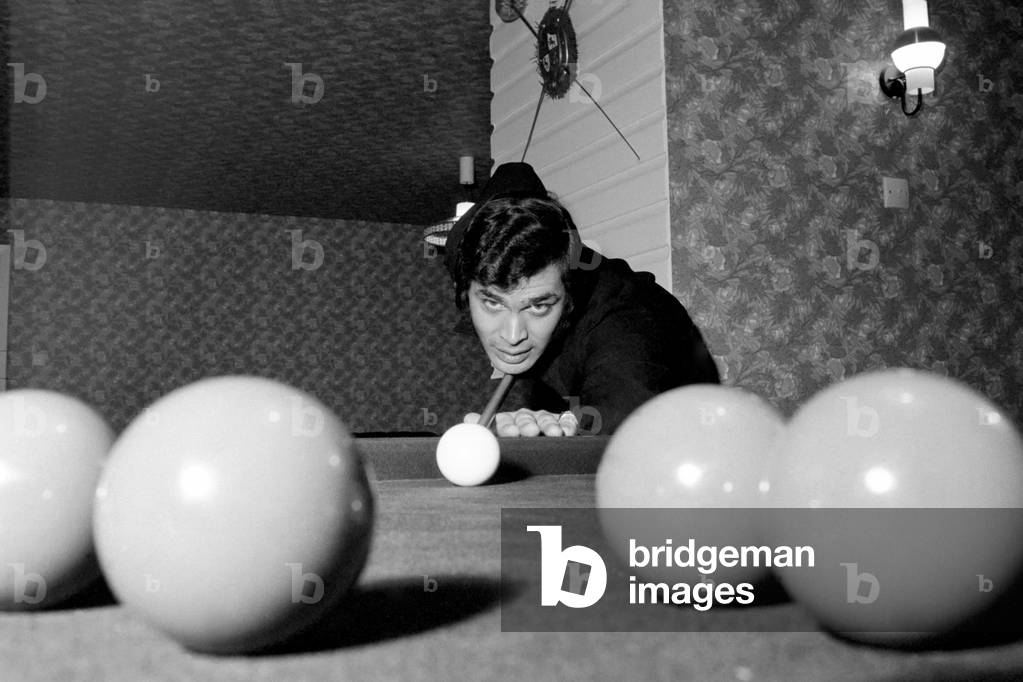 Engelbert Humperdinck's new home in St. Gerorge's Hill, Weybridge 
 Engelbert paying snooker in his games room. 
 December 1969