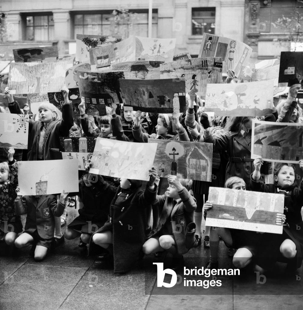 Children from The Glebe Primary School, Sussex Road, invited to illustrate 16 different categories of weather ranging from foggy nights to sunny days. At Thames Television Studio's. Children of The Glebe Primary School arriving at Television House, Kingsway brandishing their weather paintings. November 1969