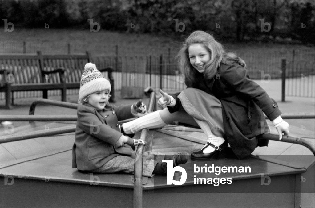 Lena Zavaroni enjoying herself in Green Park, London, 12th March 1975 (b/w photo)
