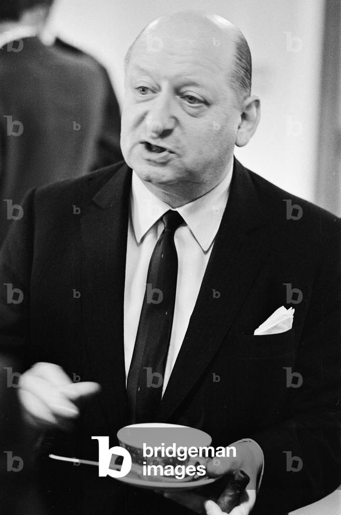 Media Mogul Lord Lew Grade at a dinner party. 24th January 1967 (b/w photo)
