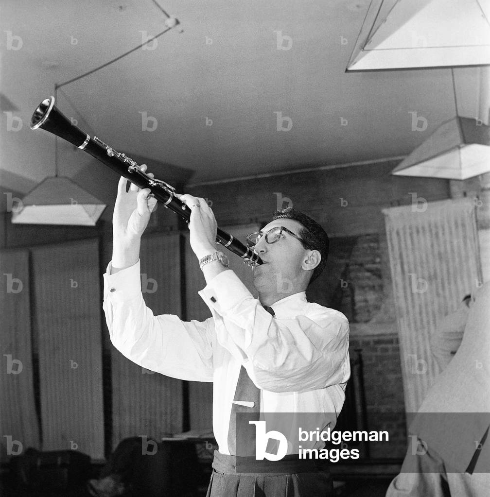 Vic Ash playing a Clarinet, on TV. October 1953 (b/w photo)