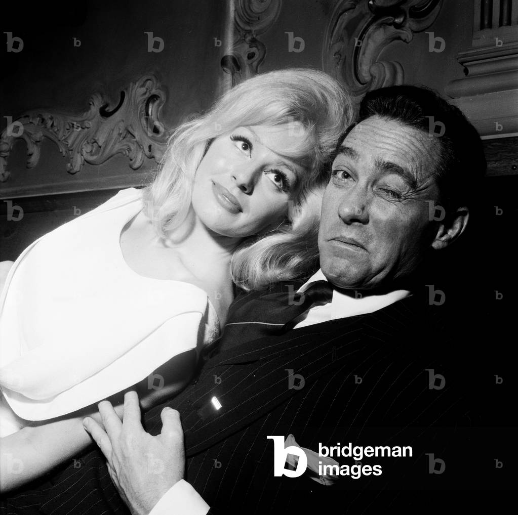 Royal midnight performance at the London Palladium on D-Day anniversary. Actor Richard Todd with Sheree Winton. 30th May 1963 (b/w photo)