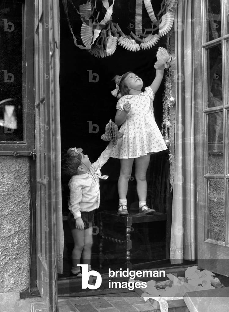 Alfieri. 1273. Child Studies-Hanging up Christmas decorations. Betty Graves and Keith.
October 15th 1933